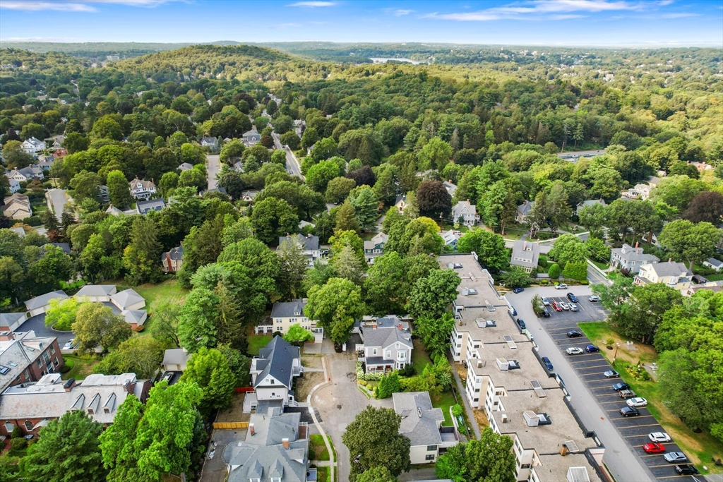 6 Wyman Court, Unit 6 Winchester, MA 01890 - Photo 34 of 35 an aerial view of a city with lots of residential buildings