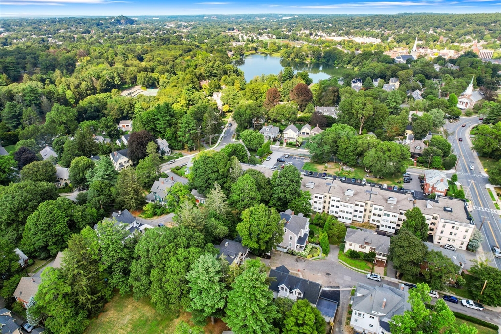 6 Wyman Court, Unit 6 Winchester, MA 01890 - Photo 35 of 35 an aerial view of residential houses with outdoor space and trees