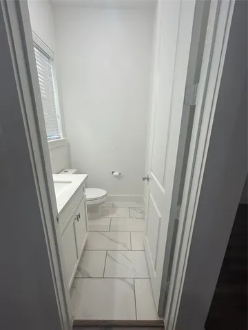 a bathroom with a sink and a toilet