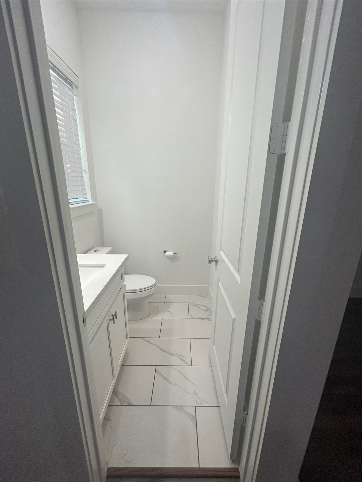 4605 Lavatera Street Houston, TX 77018 - Photo 12 of 50 a bathroom with a sink and a toilet