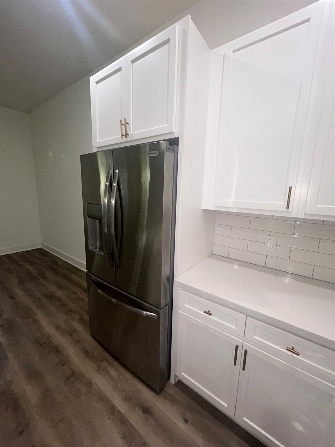 4605 Lavatera Street Houston, TX 77018 - Photo 24 of 50 a close view of a refrigerator in kitchen and empty racks
