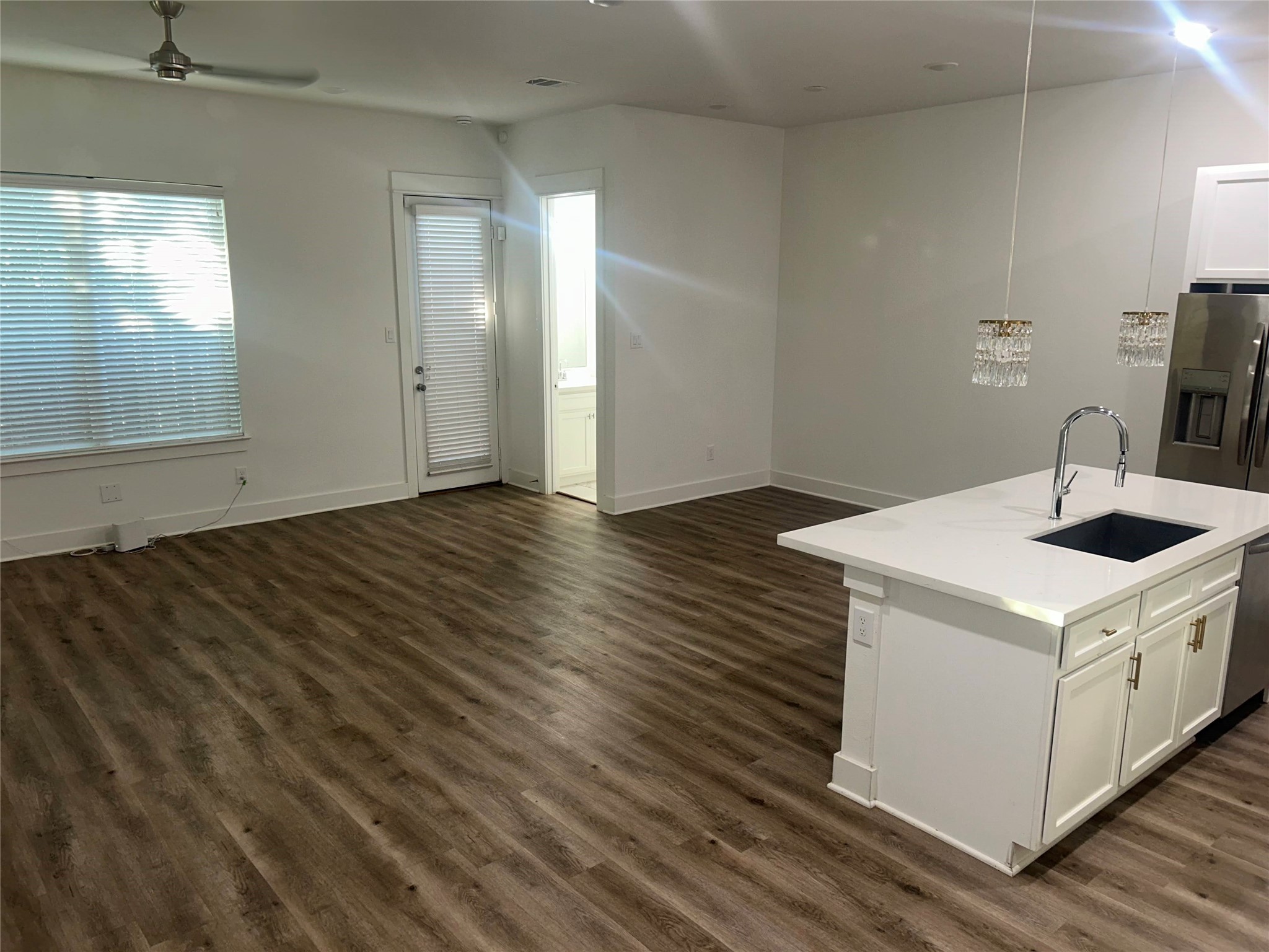 4605 Lavatera Street Houston, TX 77018 - Photo 28 of 50 an empty room with wooden floor and sink