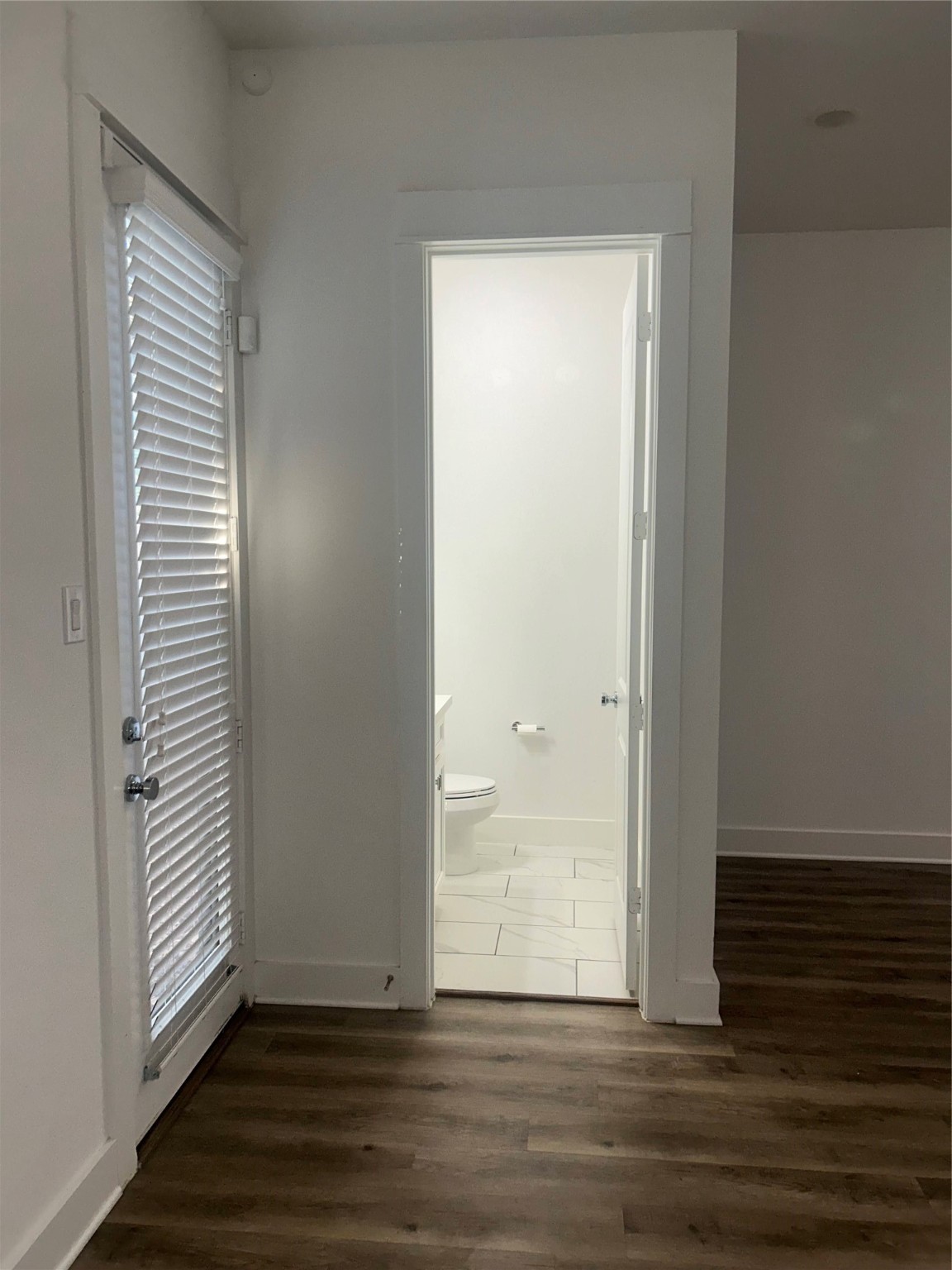 4605 Lavatera Street Houston, TX 77018 - Photo 29 of 50 a view of wooden floor and windows in a room