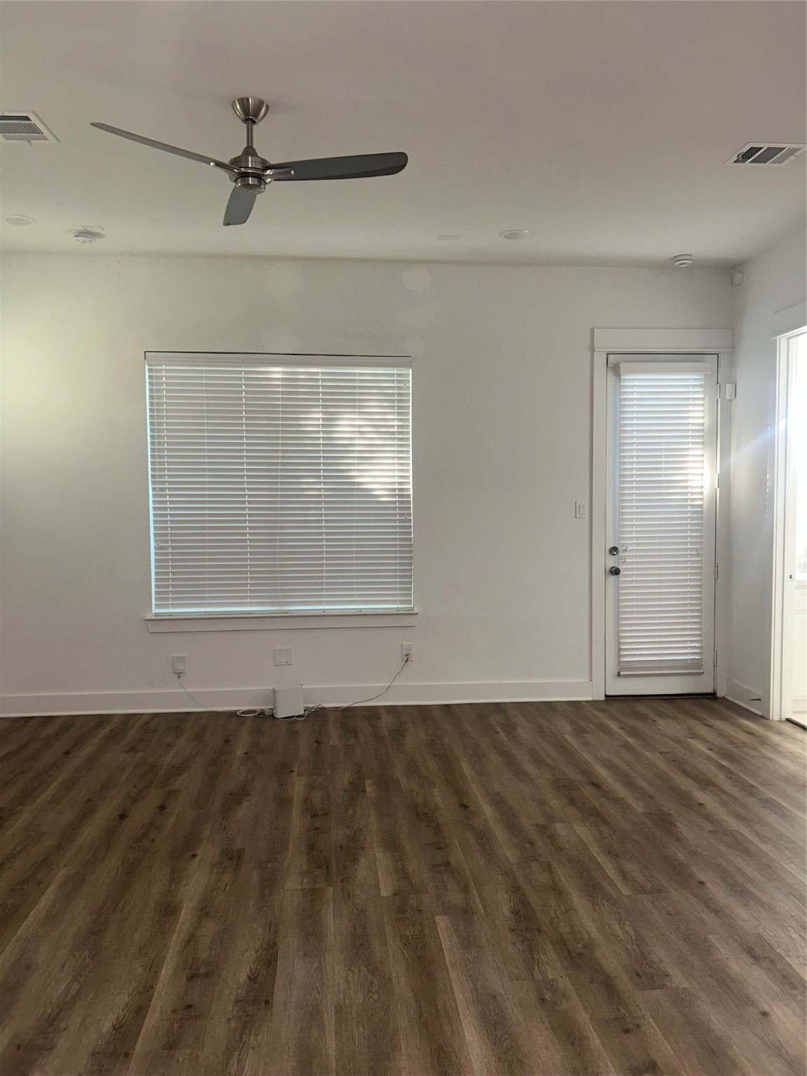 4605 Lavatera Street Houston, TX 77018 - Photo 32 of 50 a view of an empty room with a window
