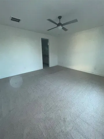 a bathroom with a double vanity sink a mirror and a shower