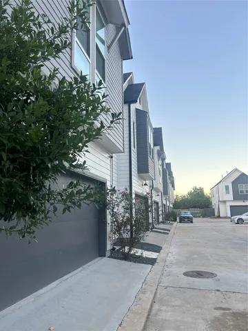 a view of a street with houses