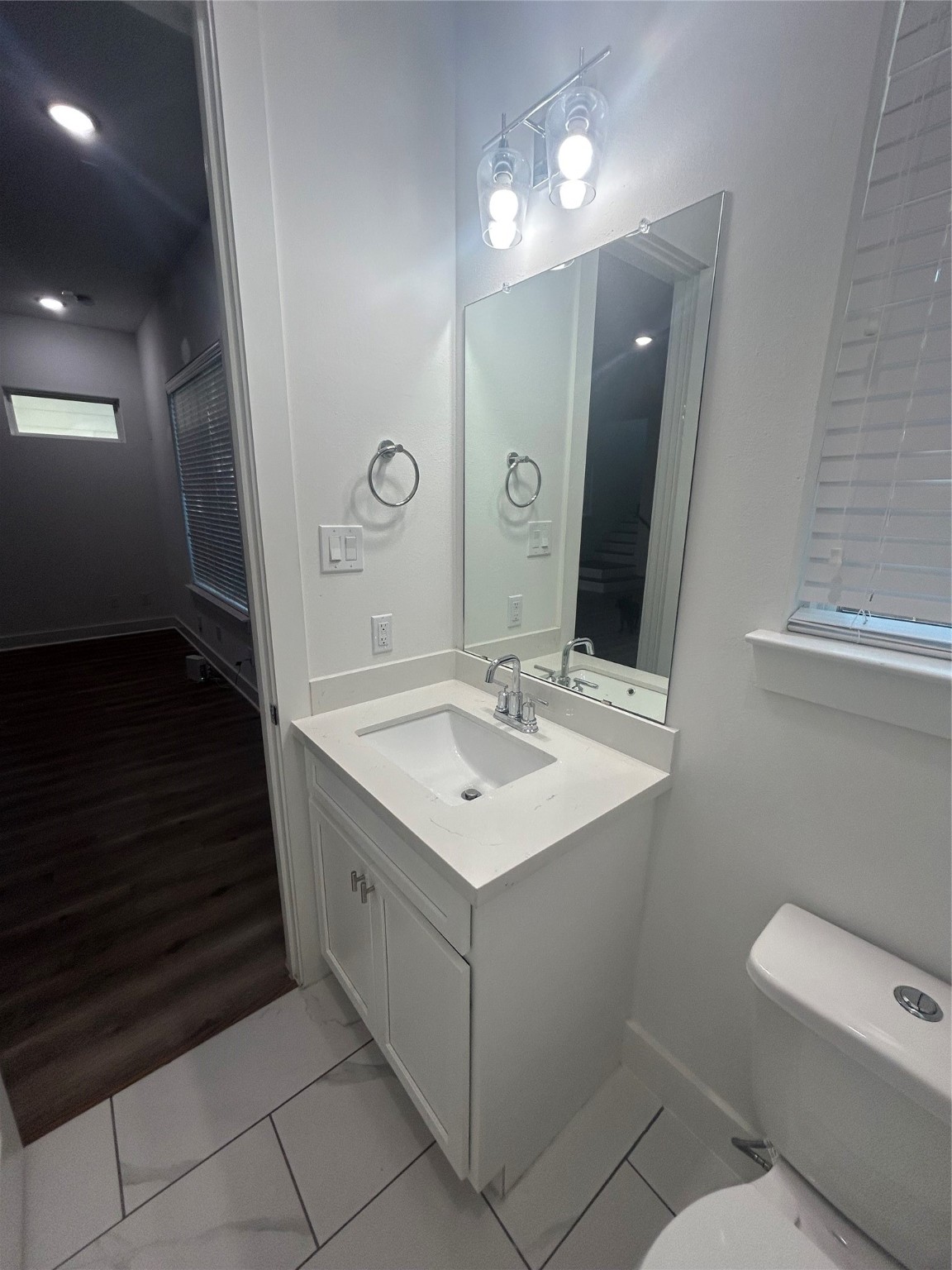 4605 Lavatera Street Houston, TX 77018 - Photo 10 of 50 a bathroom with a sink toilet and mirror