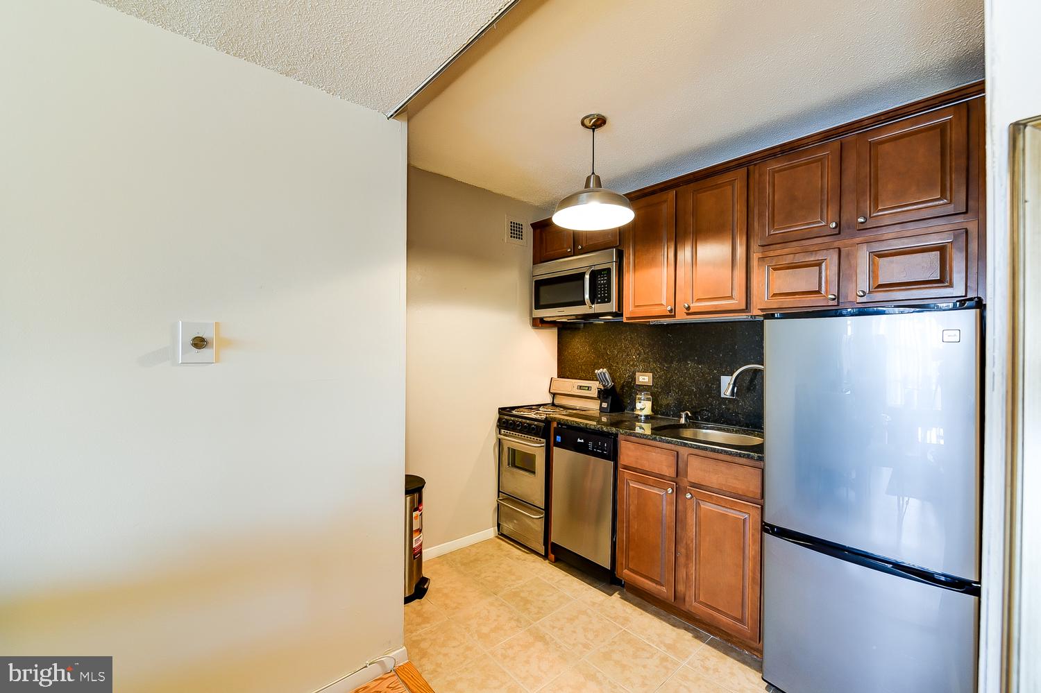 1311 Delaware Avenue Southwest, Unit S145 Washington, DC 20024 - Photo 7 of 22 View of kitchen from living room