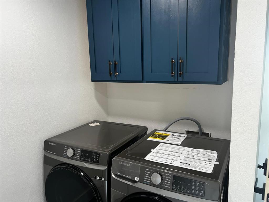 2025 County 1415 Road Bonham, TX 75418 - Photo 12 of 25 Built-in cabinetry with dark hardware