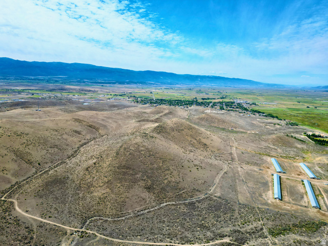 600 East E Street Moroni, UT 84646 - Photo 27 of 38 Expansive acreage featuring rolling hills, varied terrain, and distant mountain ranges