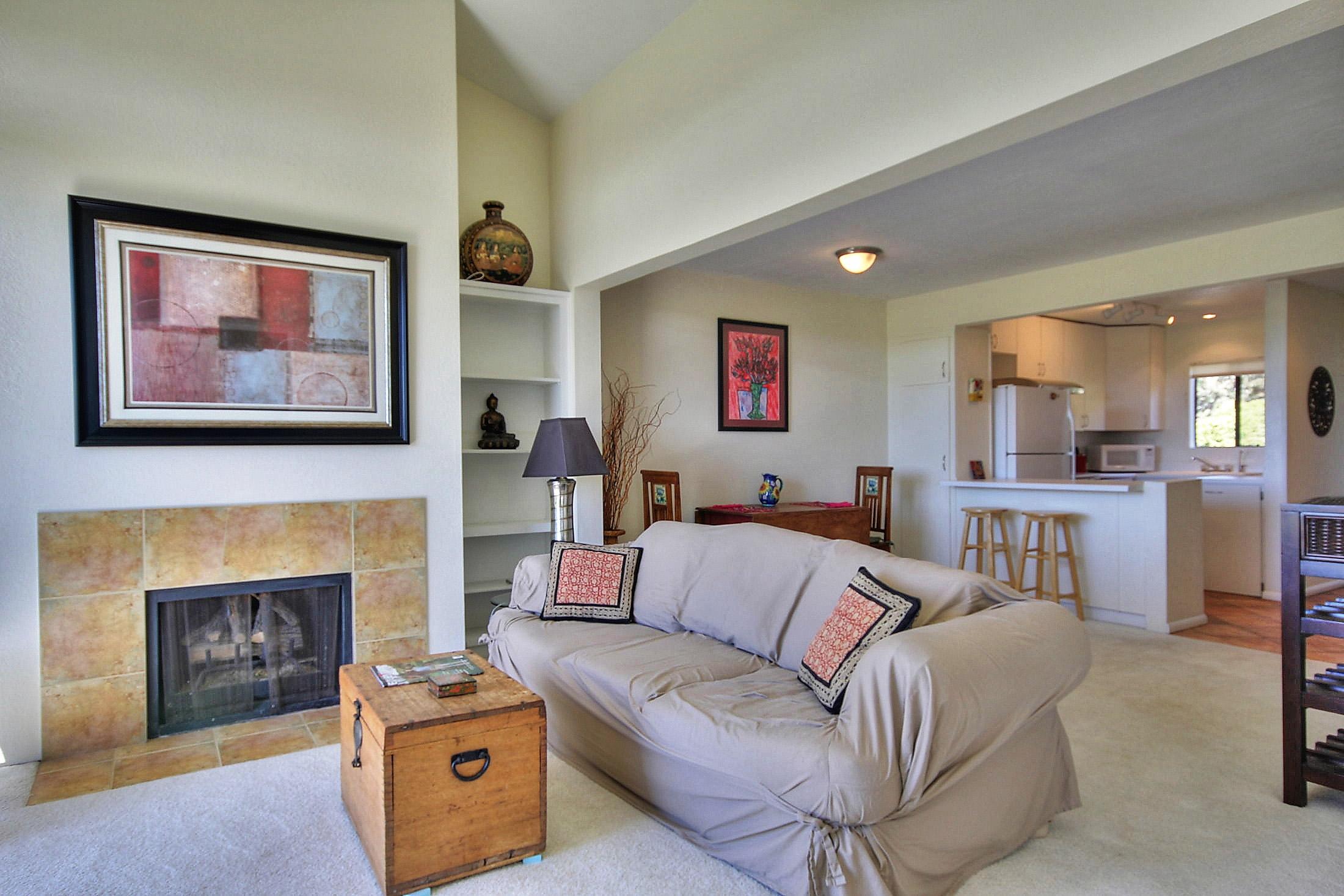 3375 Foothill Road, Unit 532 Carpinteria, CA 93013 - Photo 5 of 13 a living room with furniture and a fireplace