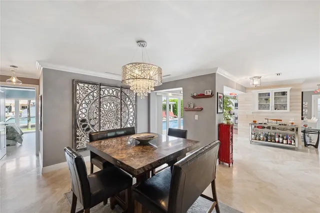 a spacious bathroom with a sink mirror and window