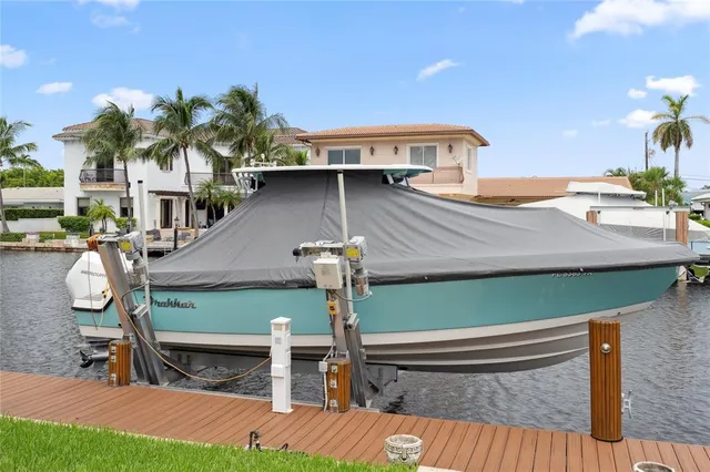 a view of swimming pool with chairs