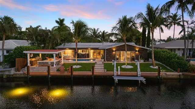 a view of a swimming pool with a lounge chair