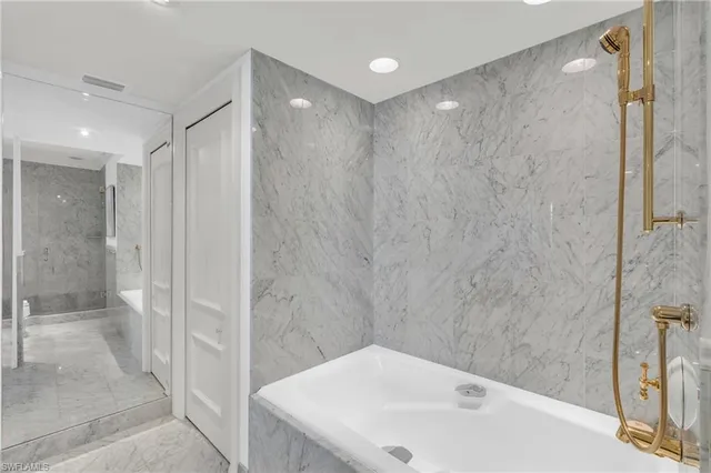 a bathroom with a sink and a shower