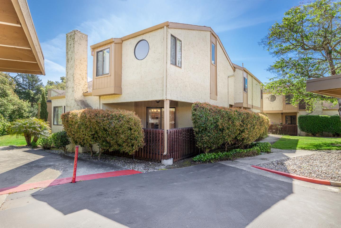 a view of backyard with tub and trees