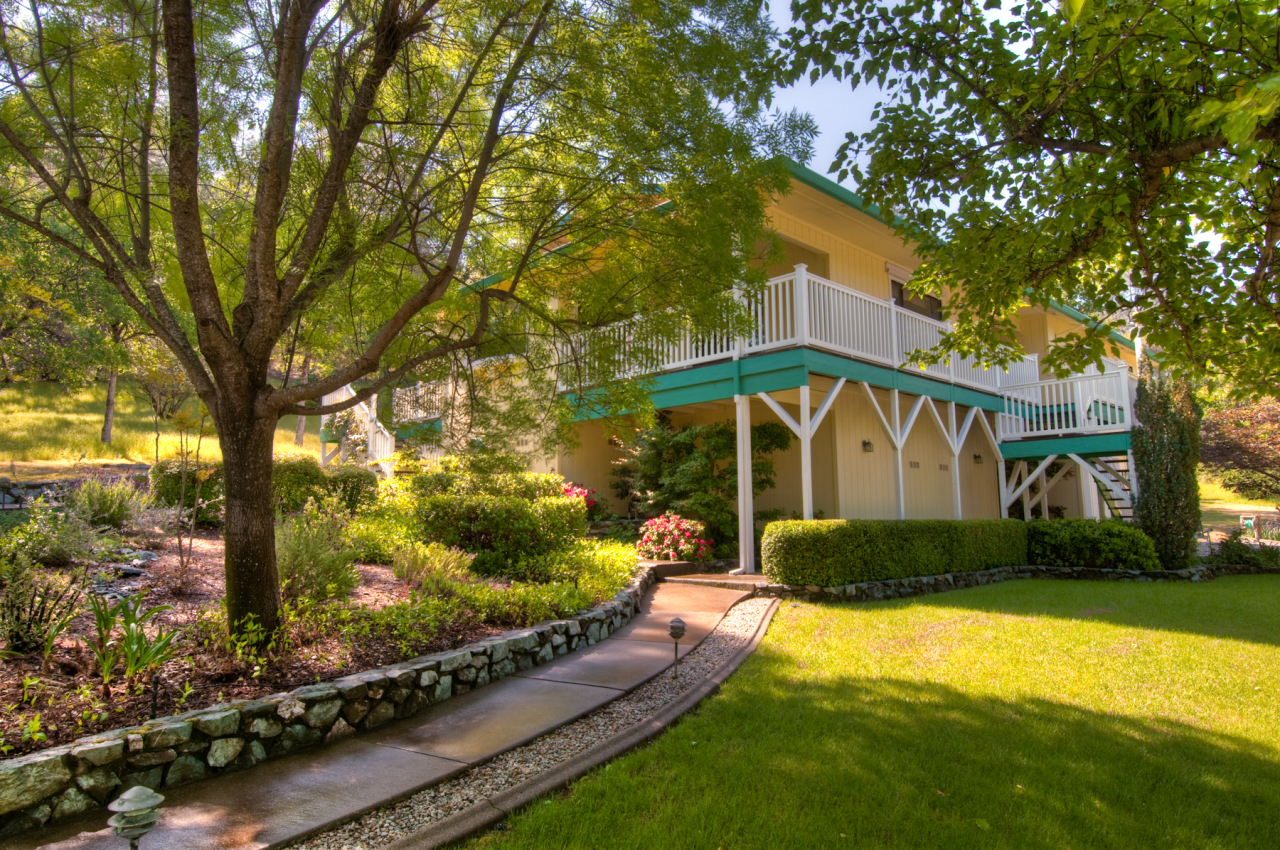 16433 Lower Springs Road Redding, CA 96001 - Photo 1 of 17 a front view of a house with a yard