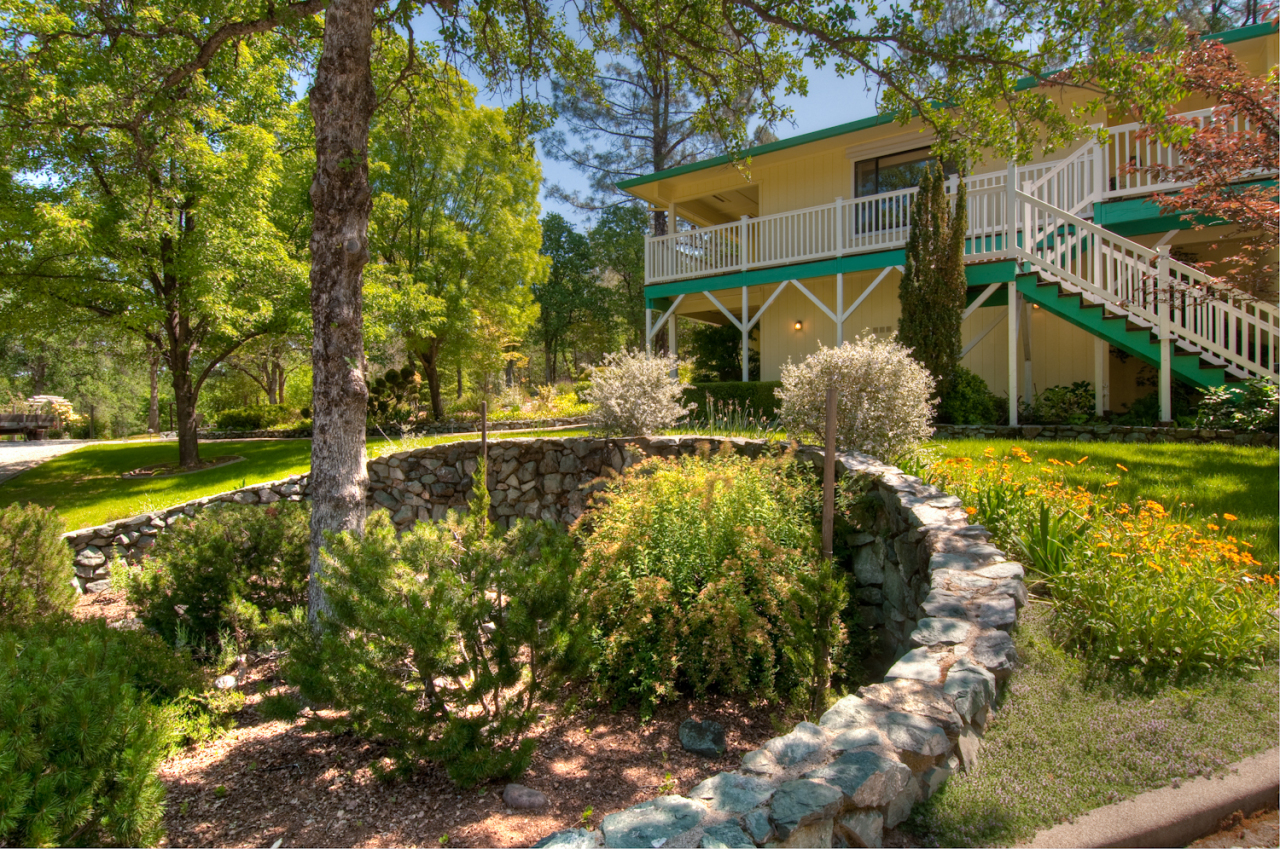 16433 Lower Springs Road Redding, CA 96001 - Photo 3 of 17 a view of swimming pool with a house in background