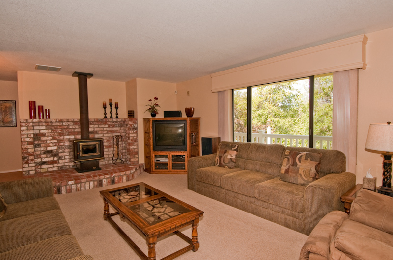 16433 Lower Springs Road Redding, CA 96001 - Photo 9 of 17 a living room with furniture and a flat screen tv