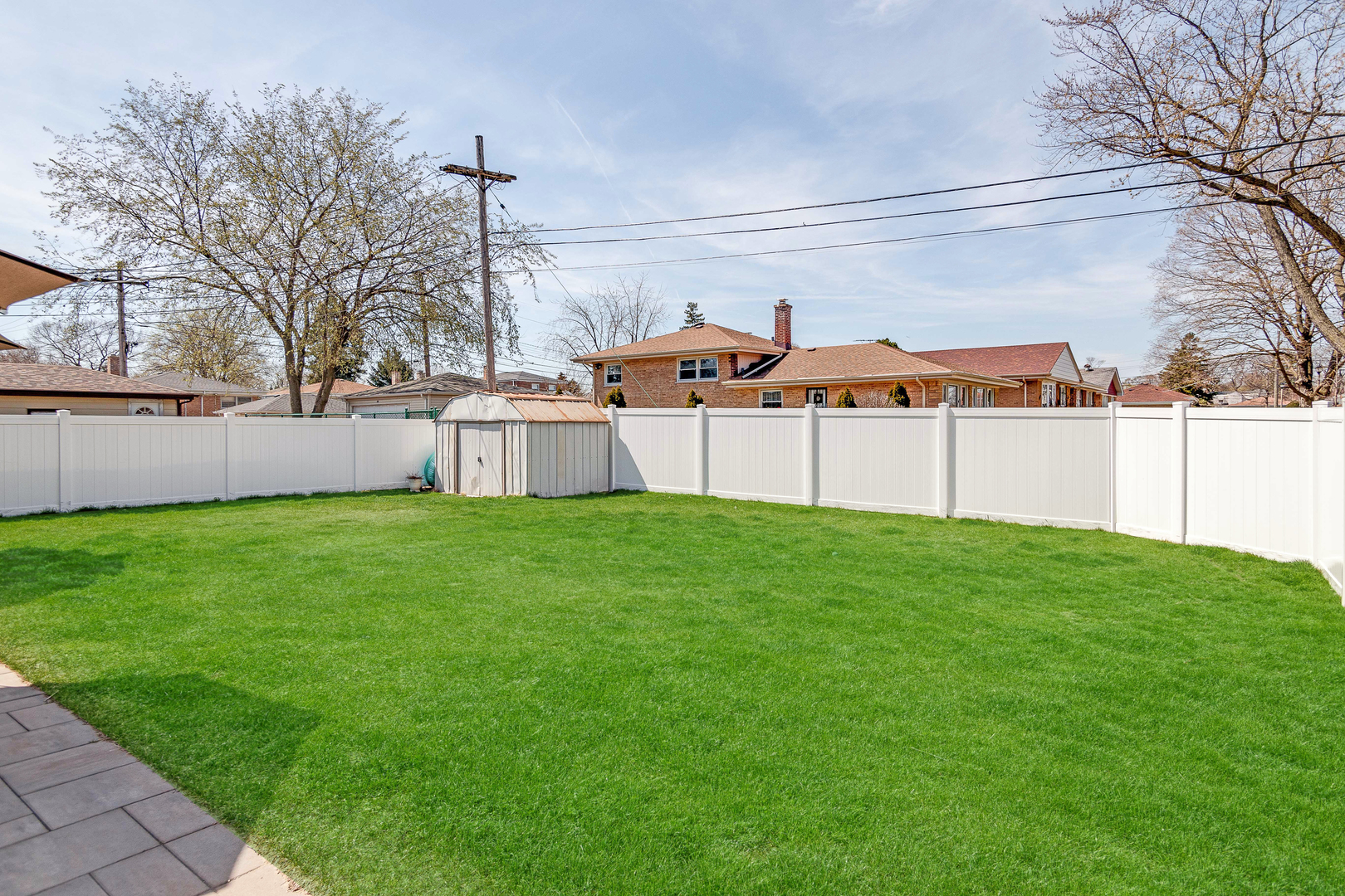 7524 East Prairie Road Skokie, IL 60076 - Photo 43 of 55 a view of a house with a backyard