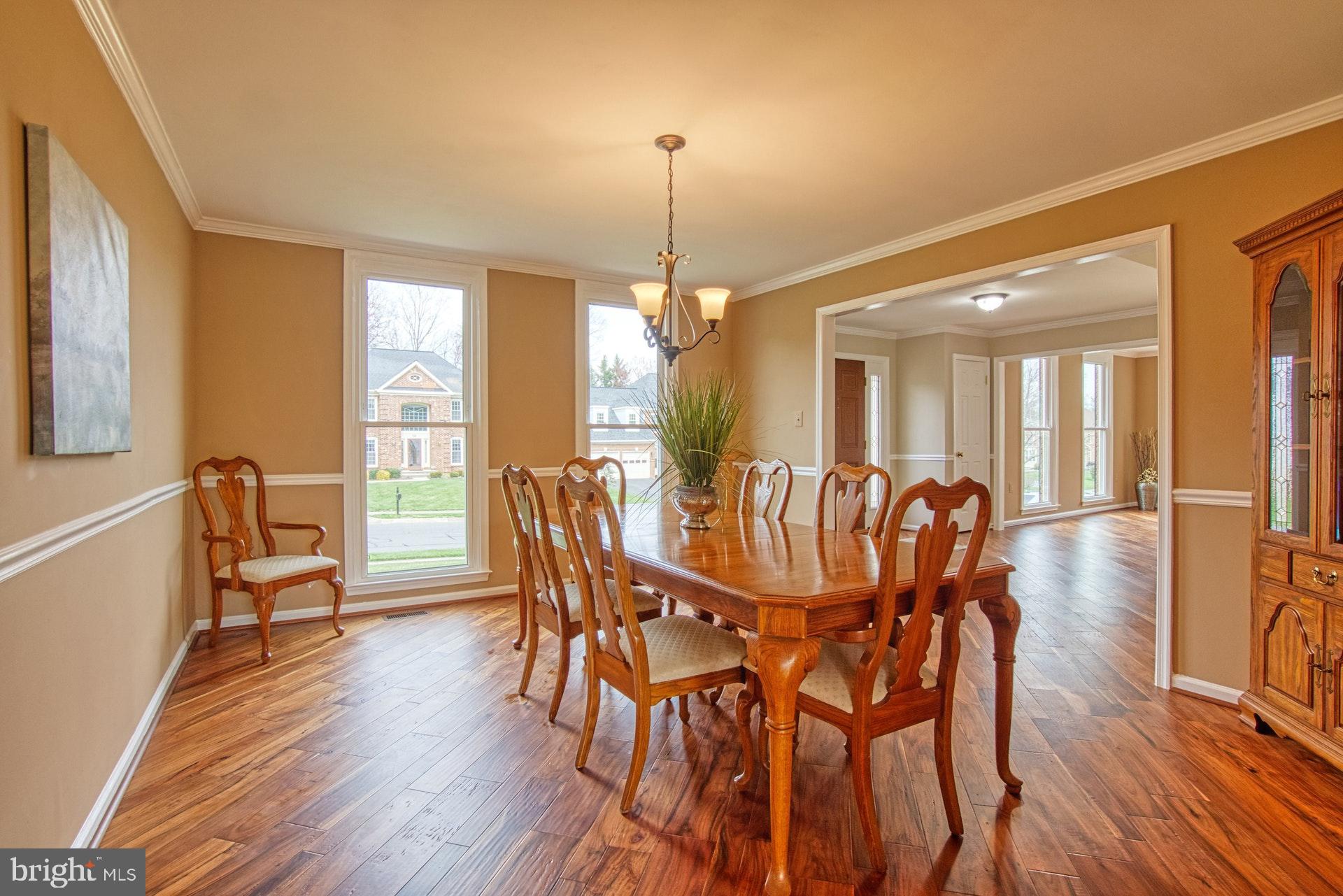 719 Old Hunt Way Herndon, VA 20170 - Photo 11 of 58 Formal Dining Room with Chair Rail