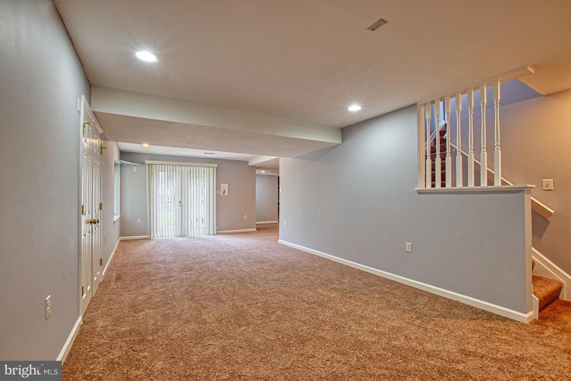 719 Old Hunt Way Herndon, VA 20170 - Photo 33 of 58 Fully finished lower level with walk-out to yard