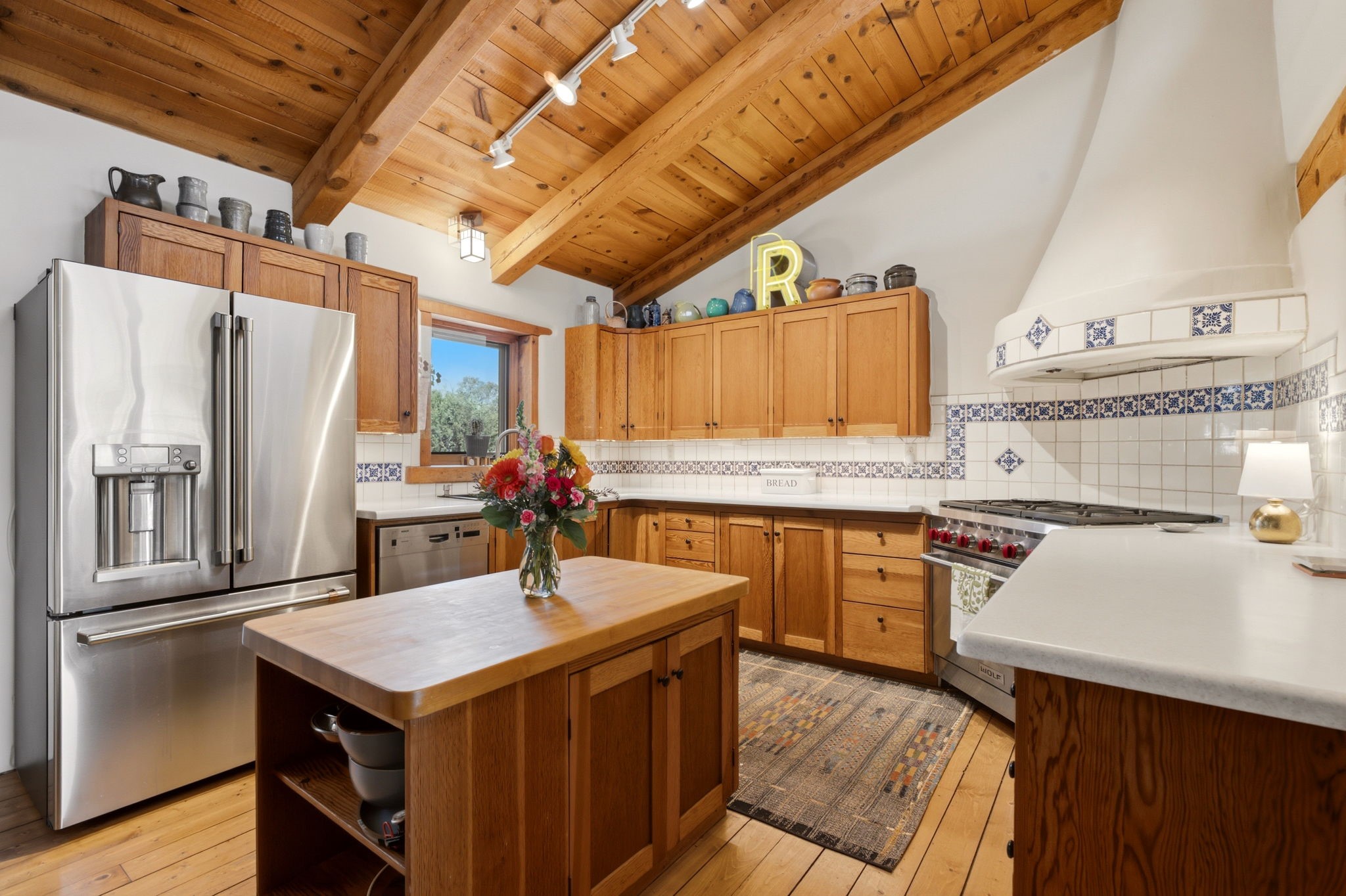22 Mimosa Road Santa Fe, NM 87508 - Photo 6 of 51 Custom range hood and stainless appliances