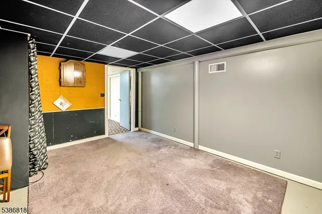 a room with furniture and a chair