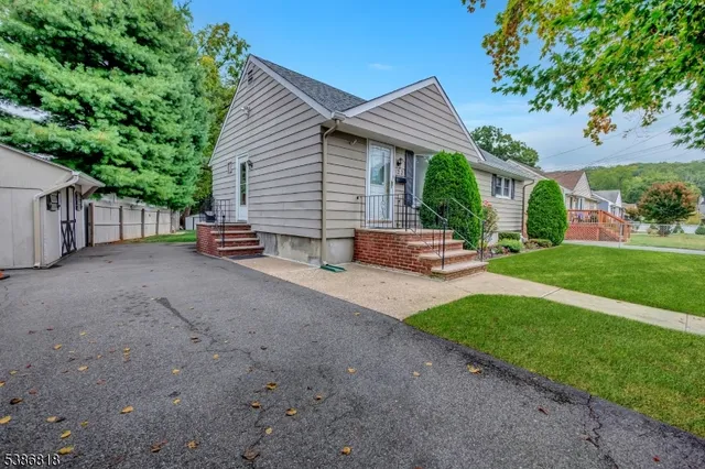 a view of a house with a big yard