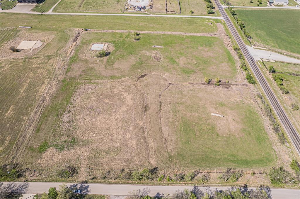 12588 Flow Road Krum, TX 76249 - Photo 4 of 20 a view of a swimming pool