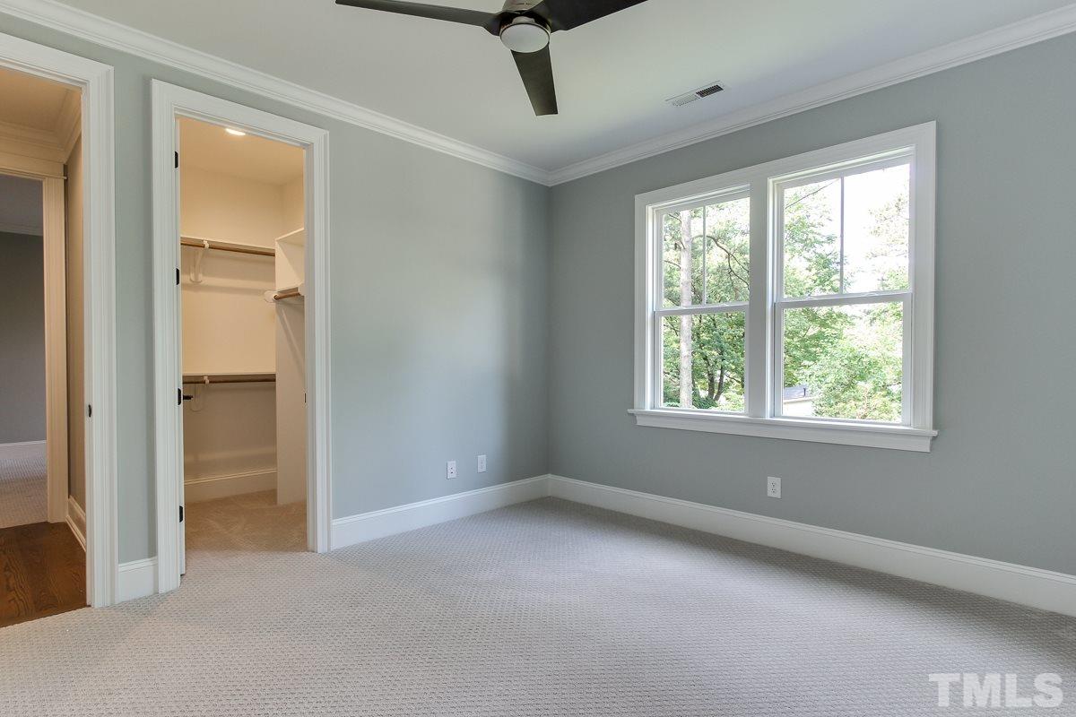 4913 Latimer Road Raleigh, NC 27609 - Photo 21 of 25 an empty room with windows and closet