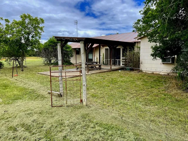 a view of yard and mountain in the back