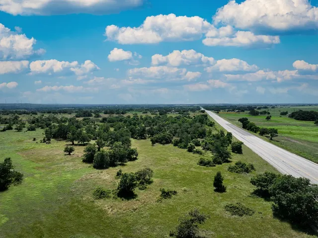 a view of a city with lots of trees