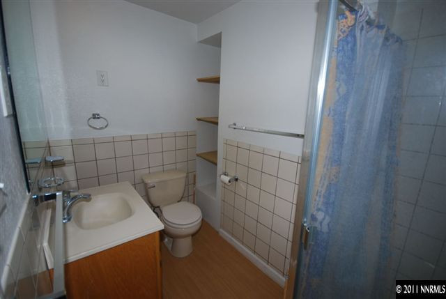 1095 Hot Springs Road Reno, NV 89521 - Photo 10 of 13 a bathroom with a sink and toilet