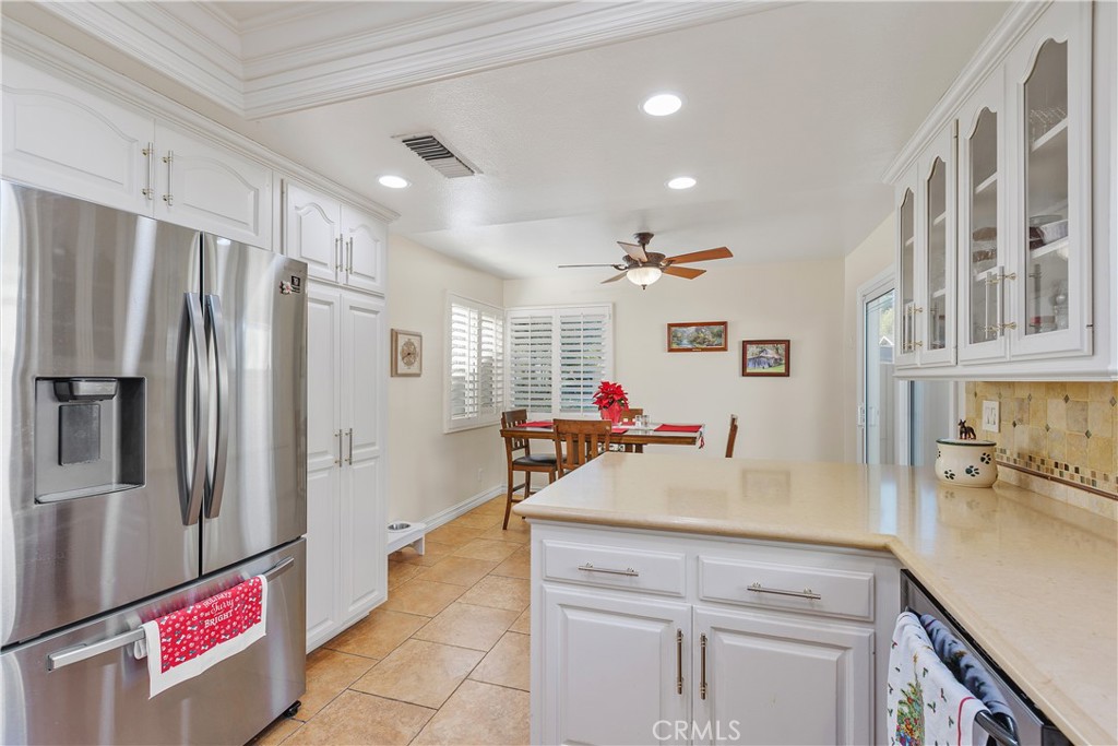 547 Vía Zapata Riverside, CA 92507 - Photo 16 of 36 Beyond the kitchen is a kitchenette area with ample space for a casual dining or gathering space.