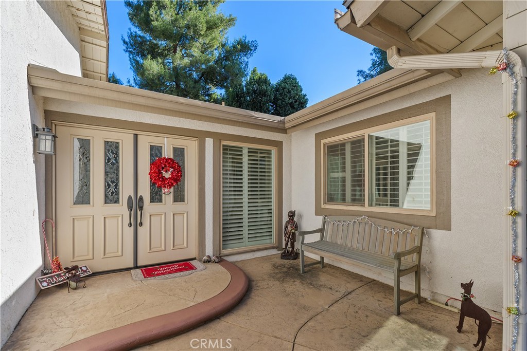 547 Vía Zapata Riverside, CA 92507 - Photo 3 of 36 The entry courtyard welcomes you to this lovely home.