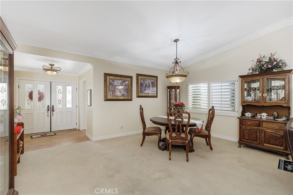 547 Vía Zapata Riverside, CA 92507 - Photo 10 of 36 The dining room has ample space for a large table. Also, the windows throughout the home have wood shutters.