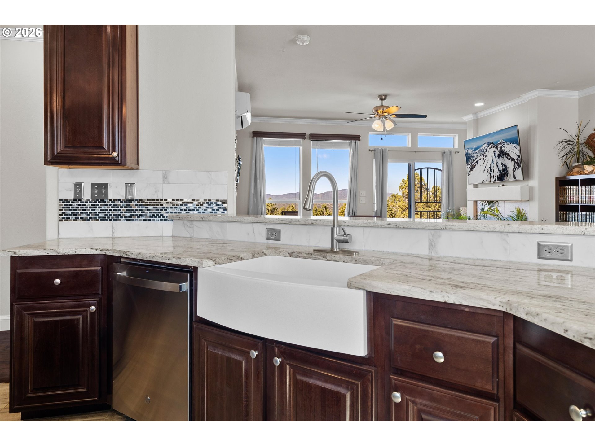5172 Southeast Oswego Road Prineville, OR 97754 - Photo 10 of 48 a kitchen with a sink and cabinets