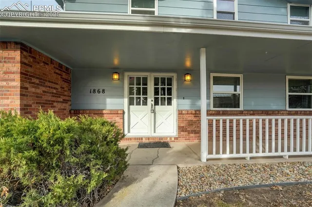 a view of a entrance door of the house