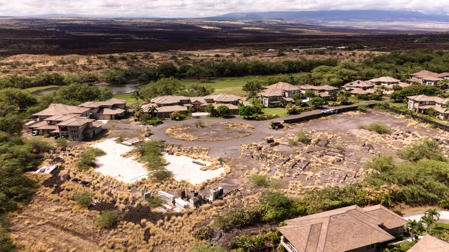 a view of staircase and kitchen with sink