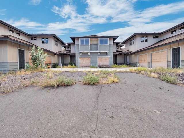 a view of kitchen with furniture and wooden floor