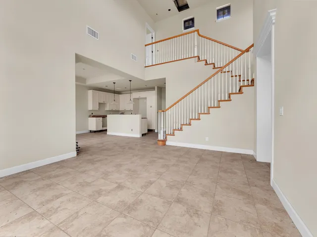 a large space with white cabinets