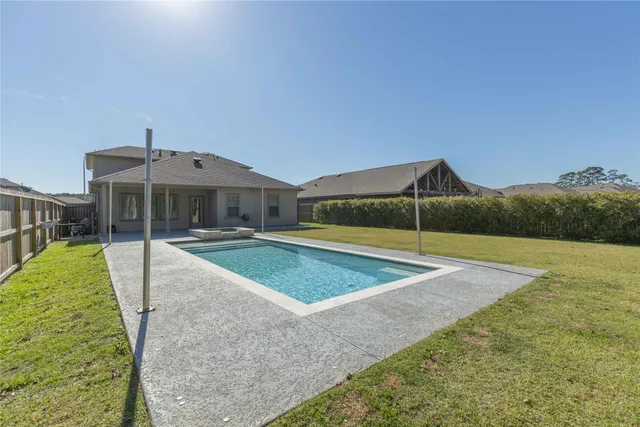 a view of outdoor space with swimming pool and outdoor seating
