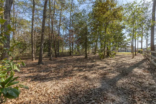 a view of a lake with a big yard