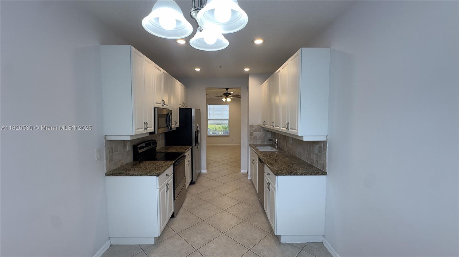 1587 Frederick Small Road Jupiter, FL 33458 - Photo 11 of 30 a view of a kitchen with a sink