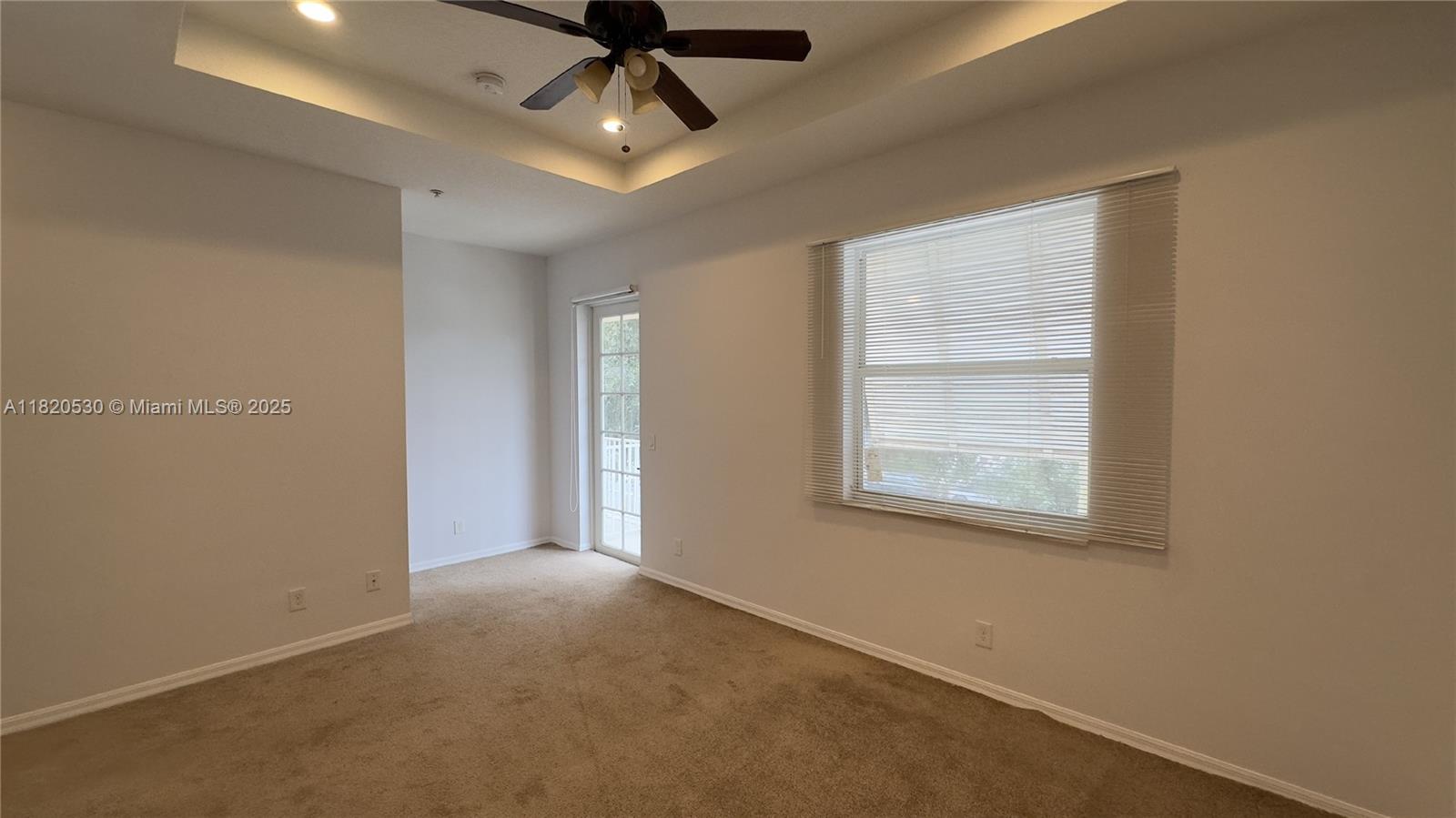 1587 Frederick Small Road Jupiter, FL 33458 - Photo 19 of 30 a view of an empty room with a window