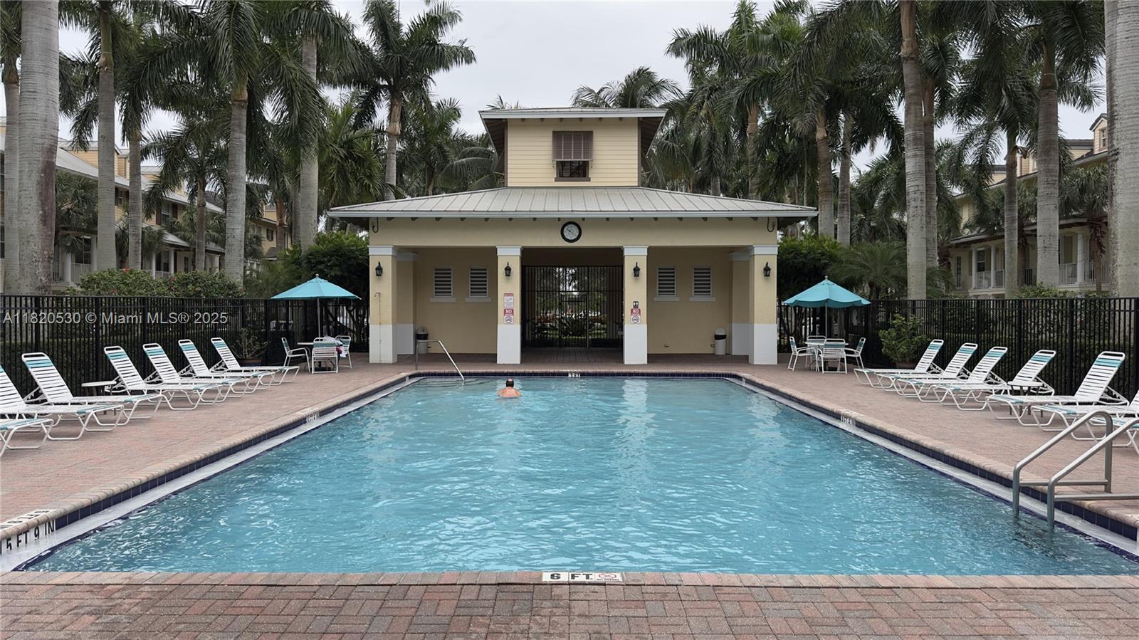 1587 Frederick Small Road Jupiter, FL 33458 - Photo 29 of 30 front view of a house with a yard