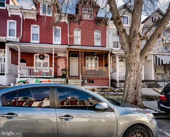 a view of a car park in front of a building