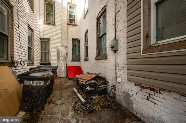 a view of balcony with wooden floor