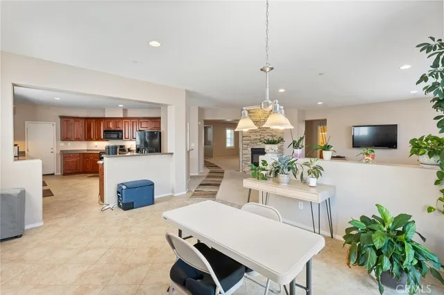 a large kitchen with stainless steel appliances lots of counter top space